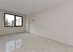 شقة 2 غرفة وصالة -ضمن مجمع سكني حديث -في مركز الانيا 