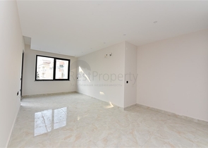 شقة 2 غرفة وصالة -ضمن مجمع سكني حديث -في مركز الانيا 