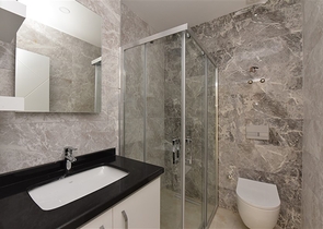 شقة 2 غرفة وصالة -ضمن مجمع سكني حديث -في مركز الانيا 