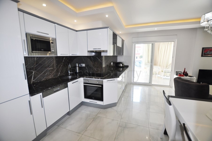 ضمن مجمع فاخر - قريب من البحر - شقة غرفة وصالة مفروشة - في مهوتلار / الانيا 