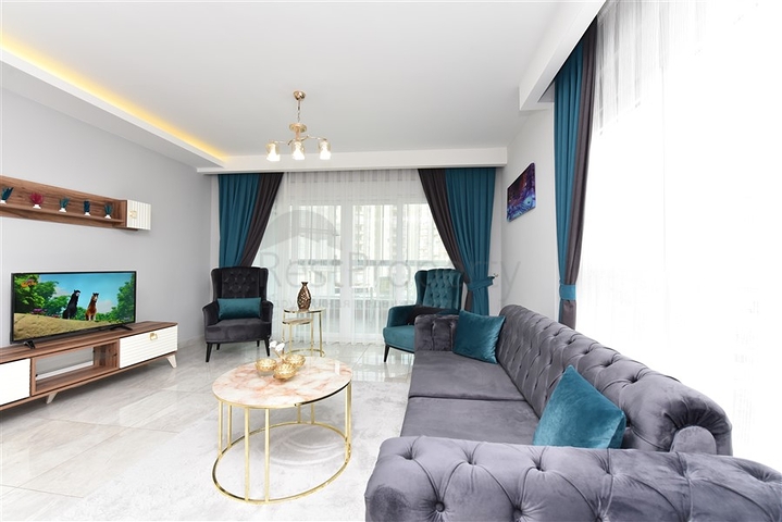 شقة غرفة وصالة - واسعة نسبيا - مفروشة وضمن مجمع حديث - في مهموتلار / الانيا 