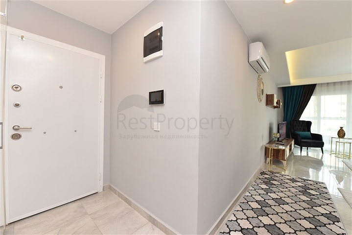 شقة غرفة وصالة - واسعة نسبيا - مفروشة وضمن مجمع حديث - في مهموتلار / الانيا 