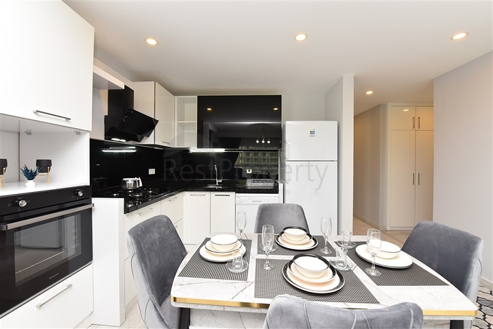 شقة غرفة وصالة - واسعة نسبيا - مفروشة وضمن مجمع حديث - في مهموتلار / الانيا 