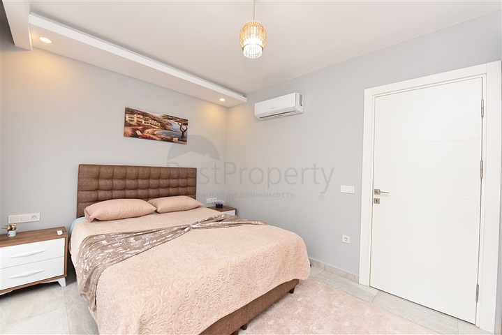 شقة غرفة وصالة - واسعة نسبيا - مفروشة وضمن مجمع حديث - في مهموتلار / الانيا 