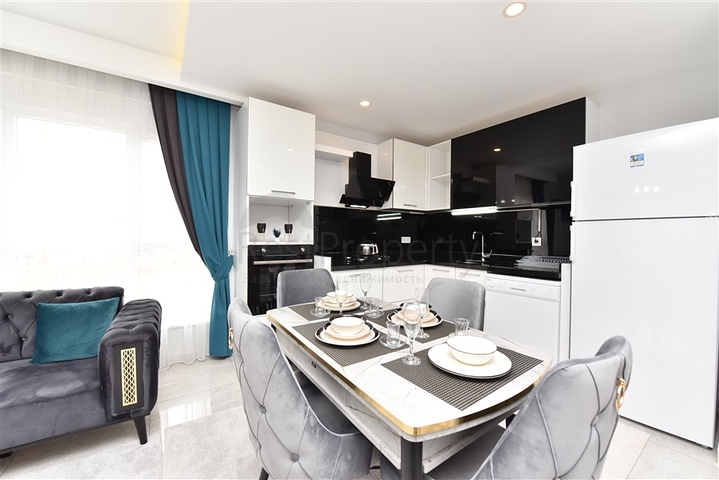 شقة غرفة وصالة - واسعة نسبيا - مفروشة وضمن مجمع حديث - في مهموتلار / الانيا 