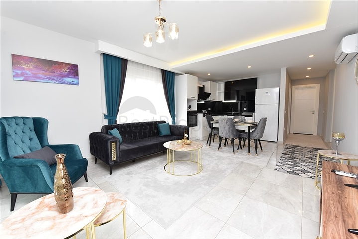 شقة غرفة وصالة - واسعة نسبيا - مفروشة وضمن مجمع حديث - في مهموتلار / الانيا 