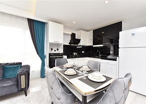 شقة غرفة وصالة - واسعة نسبيا - مفروشة وضمن مجمع حديث - في مهموتلار / الانيا 