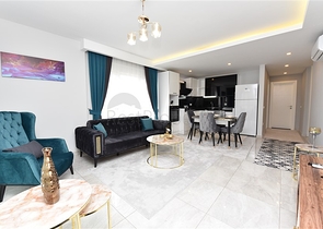 شقة غرفة وصالة - واسعة نسبيا - مفروشة وضمن مجمع حديث - في مهموتلار / الانيا 