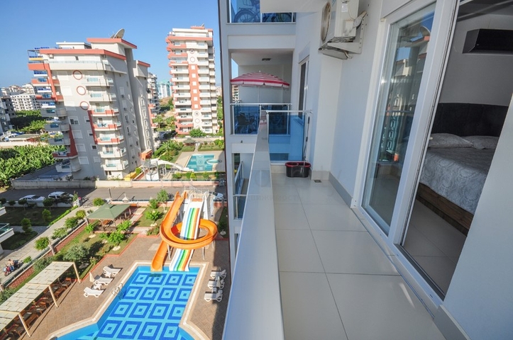 شقة ضمن مجمع يضم كافة الخدمات - تصميم 1+2 - في مهموتلار / الانيا 