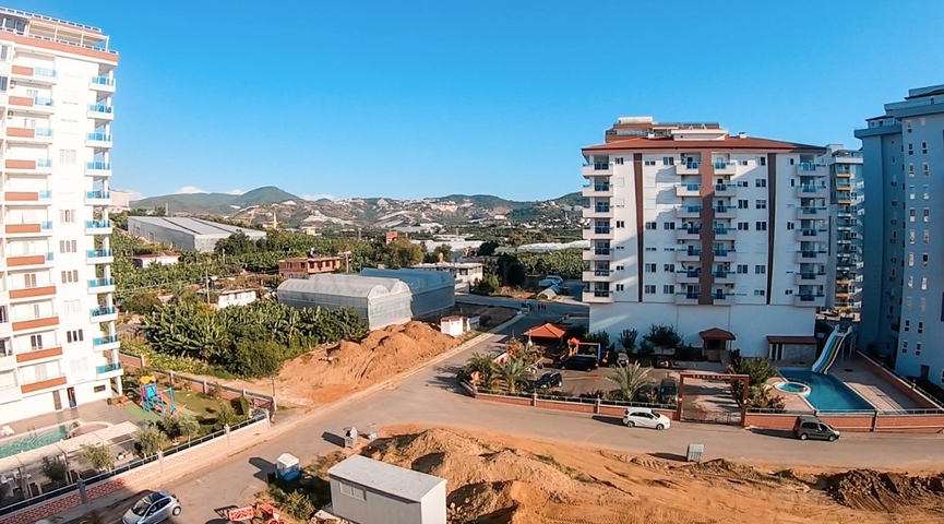 شقة ضمن مجمع يضم كافة الخدمات - تصميم 1+2 - في مهموتلار / الانيا 