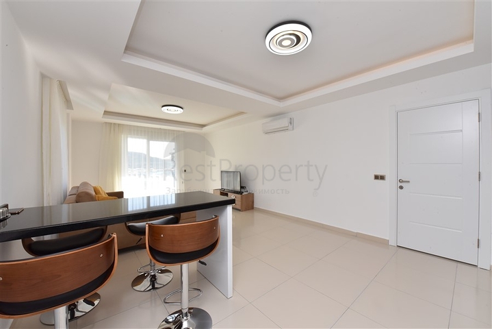 طابق مرتفع - اطلالة جبلية رائعة - شقة 1+1 - ضمن مجمع يضم كافة الخدمات - مهموتلار / الانيا 