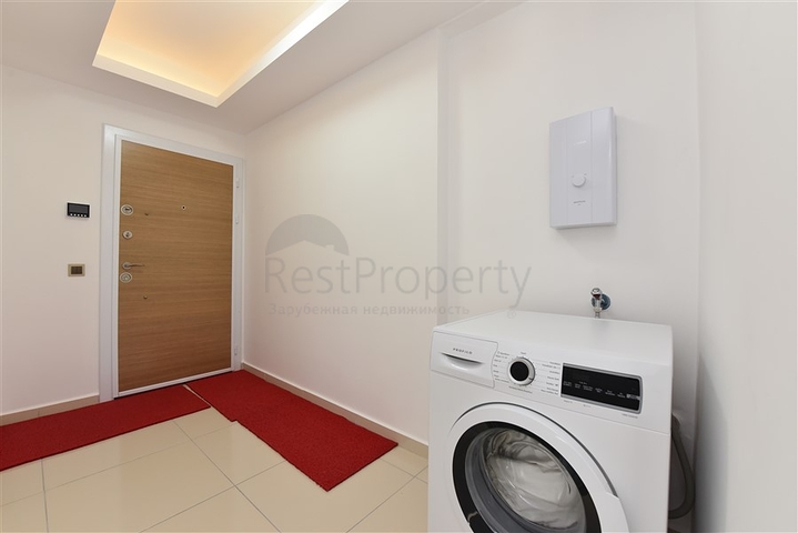 طابق مرتفع - اطلالة جبلية رائعة - شقة 1+1 - ضمن مجمع يضم كافة الخدمات - مهموتلار / الانيا 