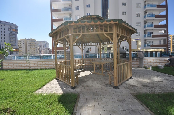 طابق مرتفع - اطلالة جبلية رائعة - شقة 1+1 - ضمن مجمع يضم كافة الخدمات - مهموتلار / الانيا 