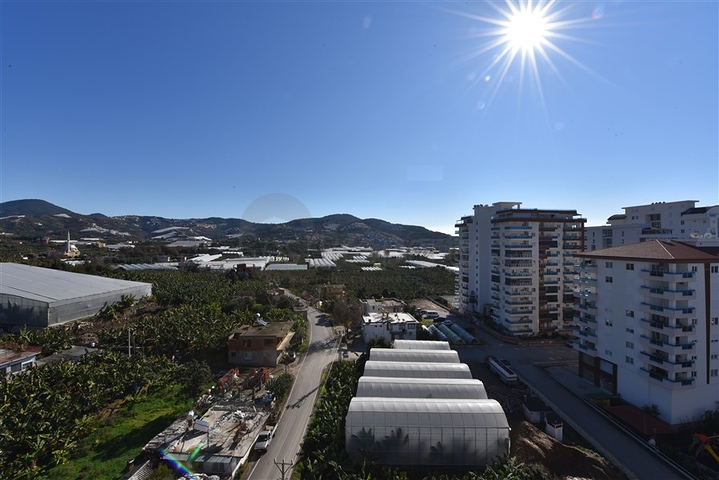 طابق مرتفع - اطلالة جبلية رائعة - شقة 1+1 - ضمن مجمع يضم كافة الخدمات - مهموتلار / الانيا 