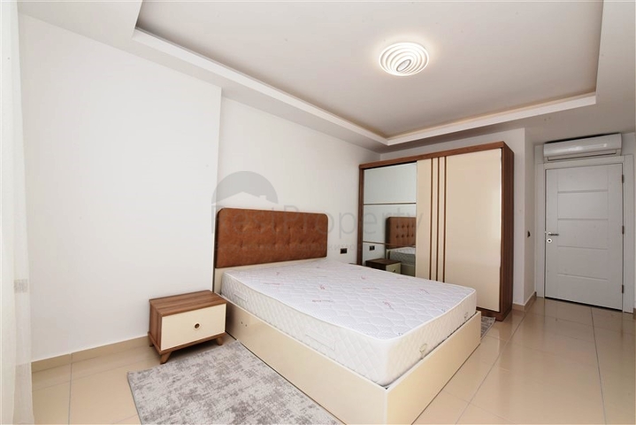 طابق مرتفع - اطلالة جبلية رائعة - شقة 1+1 - ضمن مجمع يضم كافة الخدمات - مهموتلار / الانيا 