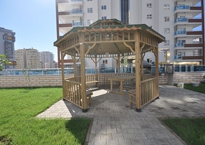 طابق مرتفع - اطلالة جبلية رائعة - شقة 1+1 - ضمن مجمع يضم كافة الخدمات - مهموتلار / الانيا 