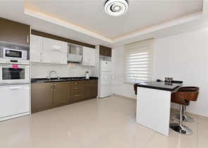 طابق مرتفع - اطلالة جبلية رائعة - شقة 1+1 - ضمن مجمع يضم كافة الخدمات - مهموتلار / الانيا 