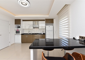 طابق مرتفع - اطلالة جبلية رائعة - شقة 1+1 - ضمن مجمع يضم كافة الخدمات - مهموتلار / الانيا 