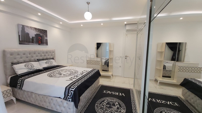 شقة غرفة وصالة -واسعة نسبيا / 83 م / - ضمن مجمع - في مهموتلار / الانيا 