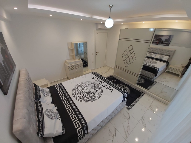 شقة غرفة وصالة -واسعة نسبيا / 83 م / - ضمن مجمع - في مهموتلار / الانيا 