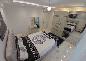 شقة غرفة وصالة -واسعة نسبيا / 83 م / - ضمن مجمع - في مهموتلار / الانيا 