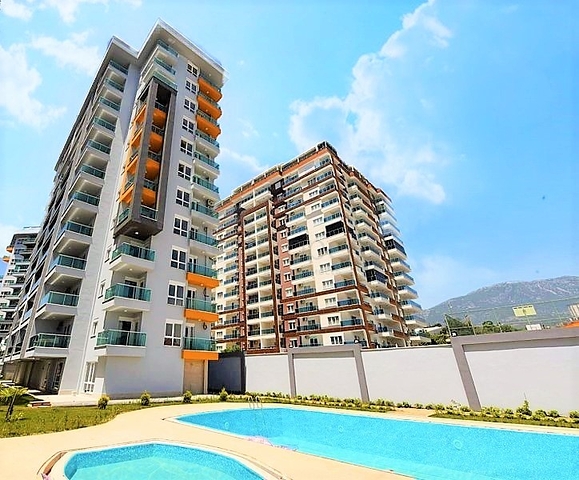 شقق مؤثثة - قريبة من البحر والاسواق - ضمن مجمع حديث - في مهموتلار / الانيا 