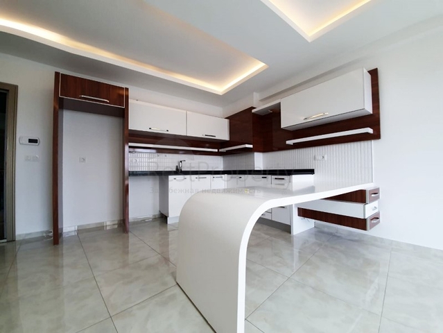 شقة ضمن مجمع فاخر - تصميم  1+1 - في مهموتلار / الانيا 