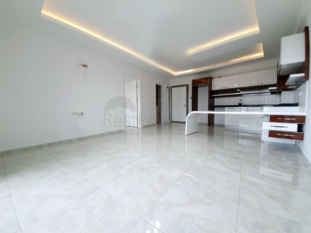 شقة ضمن مجمع فاخر - تصميم  1+1 - في مهموتلار / الانيا 