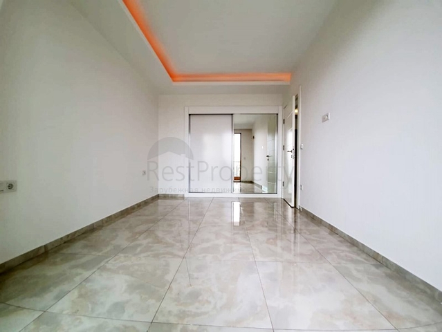 شقة ضمن مجمع فاخر - تصميم  1+1 - في مهموتلار / الانيا 