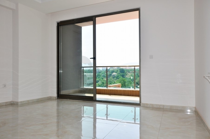 شقة ضمن مجمع فاخر - تصميم  1+1 - في مهموتلار / الانيا 