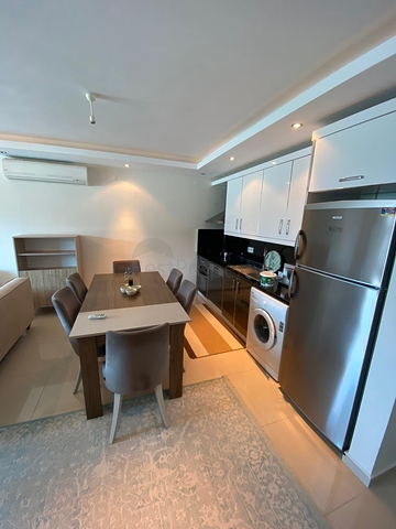 مجمع يضم كافة الخدمات -شقة غرفة وصالة - في كارجي جاك / الانيا 