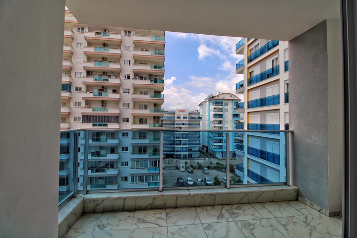 شقة غرفة وصالة -مفروشة - ضمن مجمع -قريب من البحر والخدمات -في مهموتلار / الانيا 