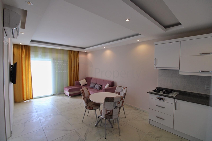 شقة غرفة وصالة -مفروشة - ضمن مجمع -قريب من البحر والخدمات -في مهموتلار / الانيا 