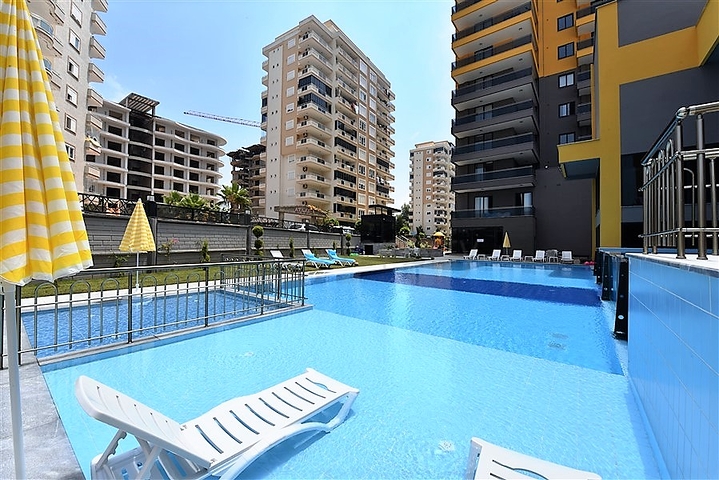 شقة 3 غرف وصالة - مطبخ مغلق - ضمن مجمع يضم كافة الخدمات - في مهموتلار / الانيا 