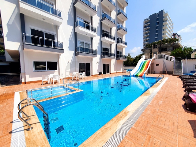 شقة غرفة وصالة -مؤثثة - ضمن مجمع سكني جديد - في مهموتلار / الانيا 