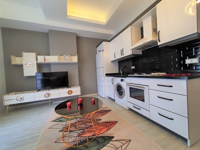 شقة غرفة وصالة -مؤثثة - ضمن مجمع سكني جديد - في مهموتلار / الانيا 