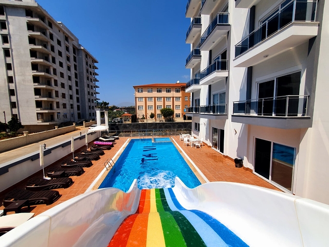 شقة غرفة وصالة -مؤثثة - ضمن مجمع سكني جديد - في مهموتلار / الانيا 