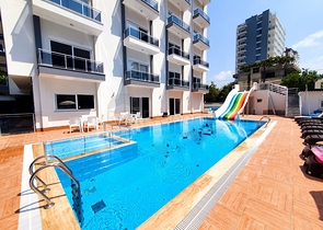 شقة غرفة وصالة -مؤثثة - ضمن مجمع سكني جديد - في مهموتلار / الانيا 