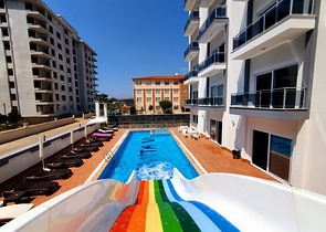 شقة غرفة وصالة -مؤثثة - ضمن مجمع سكني جديد - في مهموتلار / الانيا 