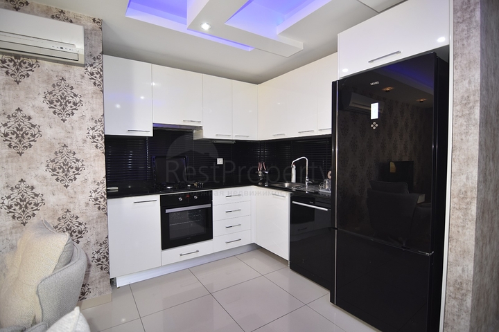 ضمن مجمع 5 نجوم - شقة غرفتين وصالة - مفروشة - في منطقة جيكجلي المركزية / الانيا 