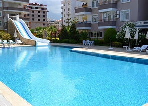 قريبة من البحر - شقة غرفتين وصالة - ضمن مجمع سكني - في مهموتلار / الانيا 