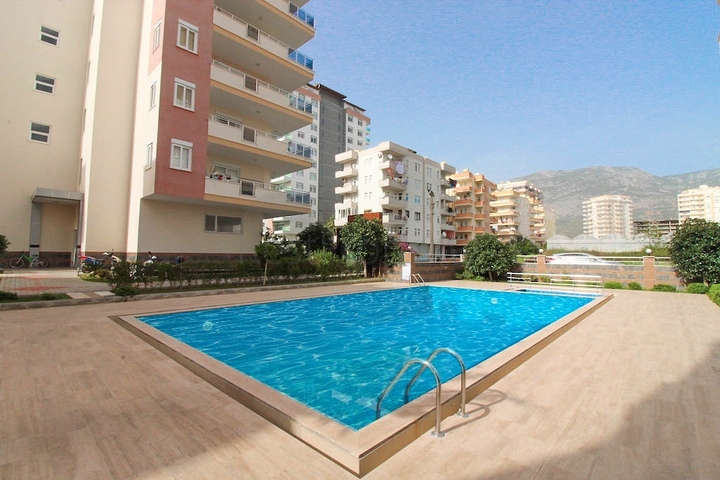 قريبة من البحر - شقة عائلية - من تصميم 1+2 - في مهموتلار / الانيا 