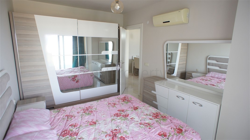 شقة مفروشة - غرفة نوم وصالة - ضمن مجمع قريب من البحر والخدمات - الانيا / مهموتلار 