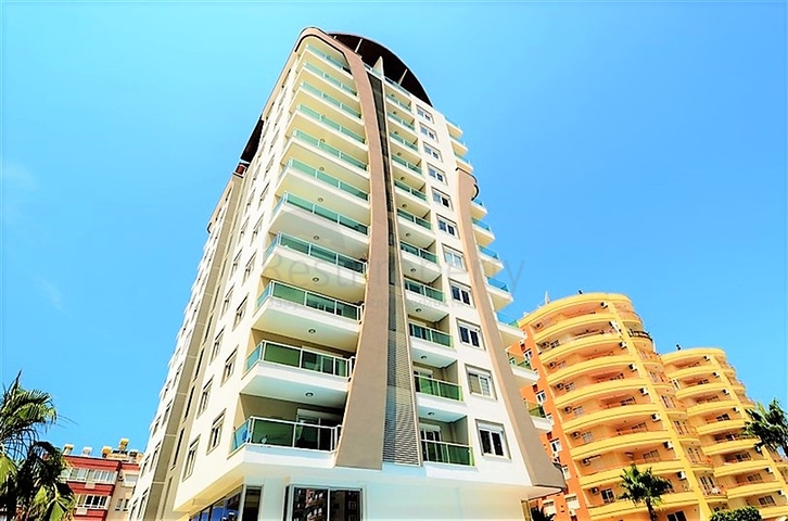 شقة مفروشة - غرفة نوم وصالة - ضمن مجمع قريب من البحر والخدمات - الانيا / مهموتلار 