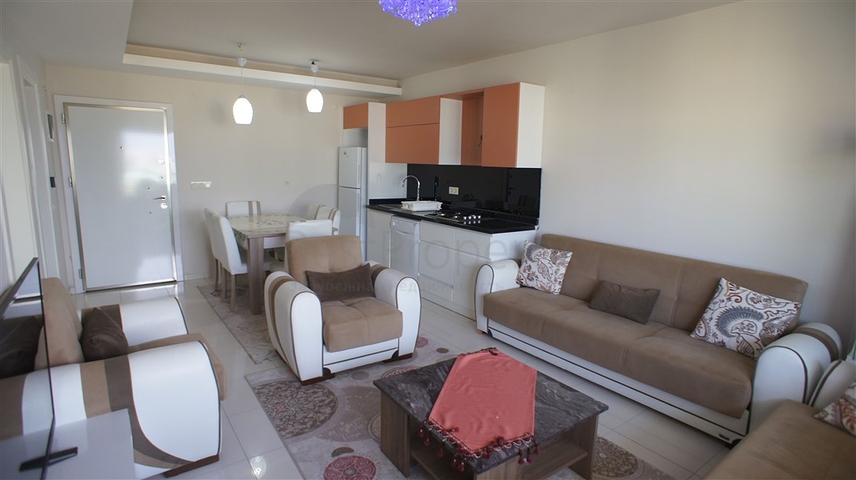 شقة مفروشة - غرفة نوم وصالة - ضمن مجمع قريب من البحر والخدمات - الانيا / مهموتلار 