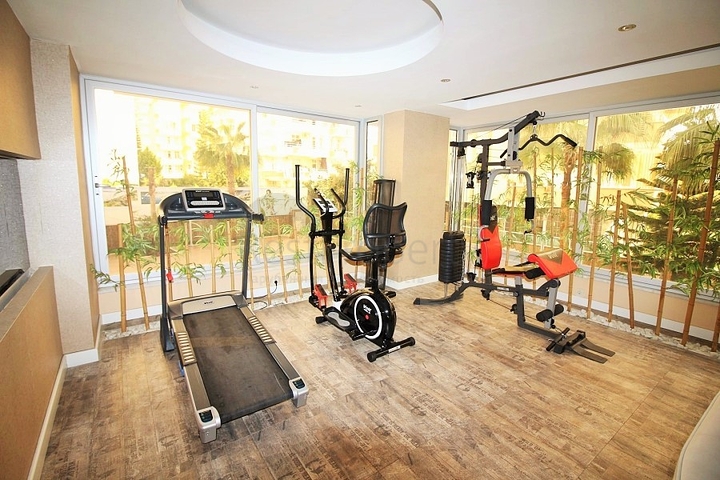 شقة مفروشة - غرفة نوم وصالة - ضمن مجمع قريب من البحر والخدمات - الانيا / مهموتلار 