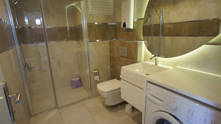 شقة مفروشة - غرفة نوم وصالة - ضمن مجمع قريب من البحر والخدمات - الانيا / مهموتلار 