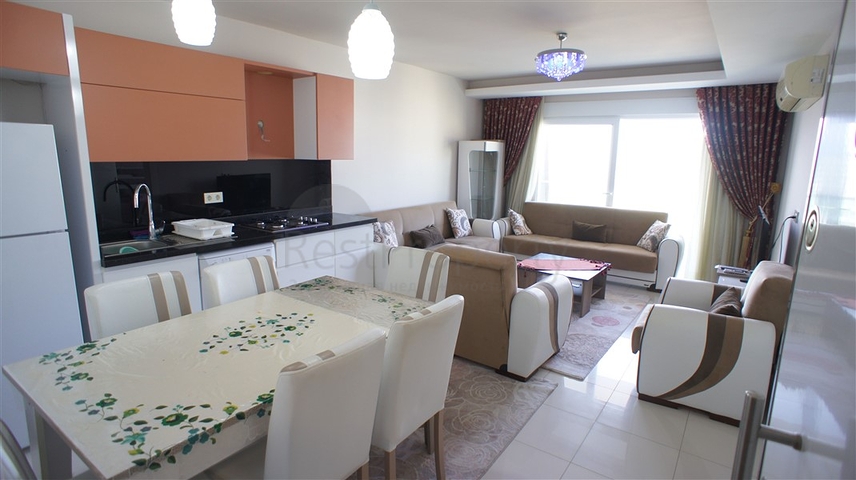 شقة مفروشة - غرفة نوم وصالة - ضمن مجمع قريب من البحر والخدمات - الانيا / مهموتلار 