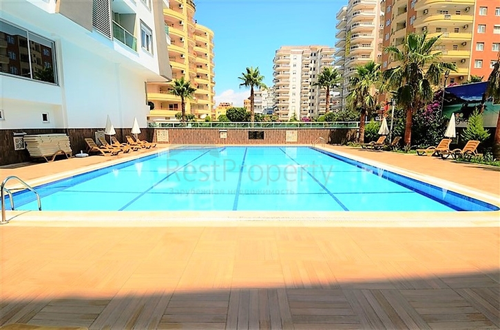 شقة مفروشة - غرفة نوم وصالة - ضمن مجمع قريب من البحر والخدمات - الانيا / مهموتلار 