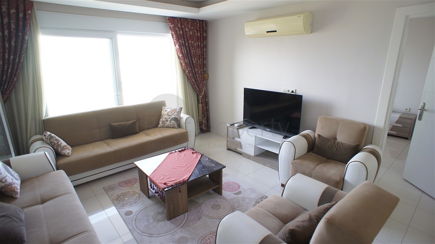 شقة مفروشة - غرفة نوم وصالة - ضمن مجمع قريب من البحر والخدمات - الانيا / مهموتلار 